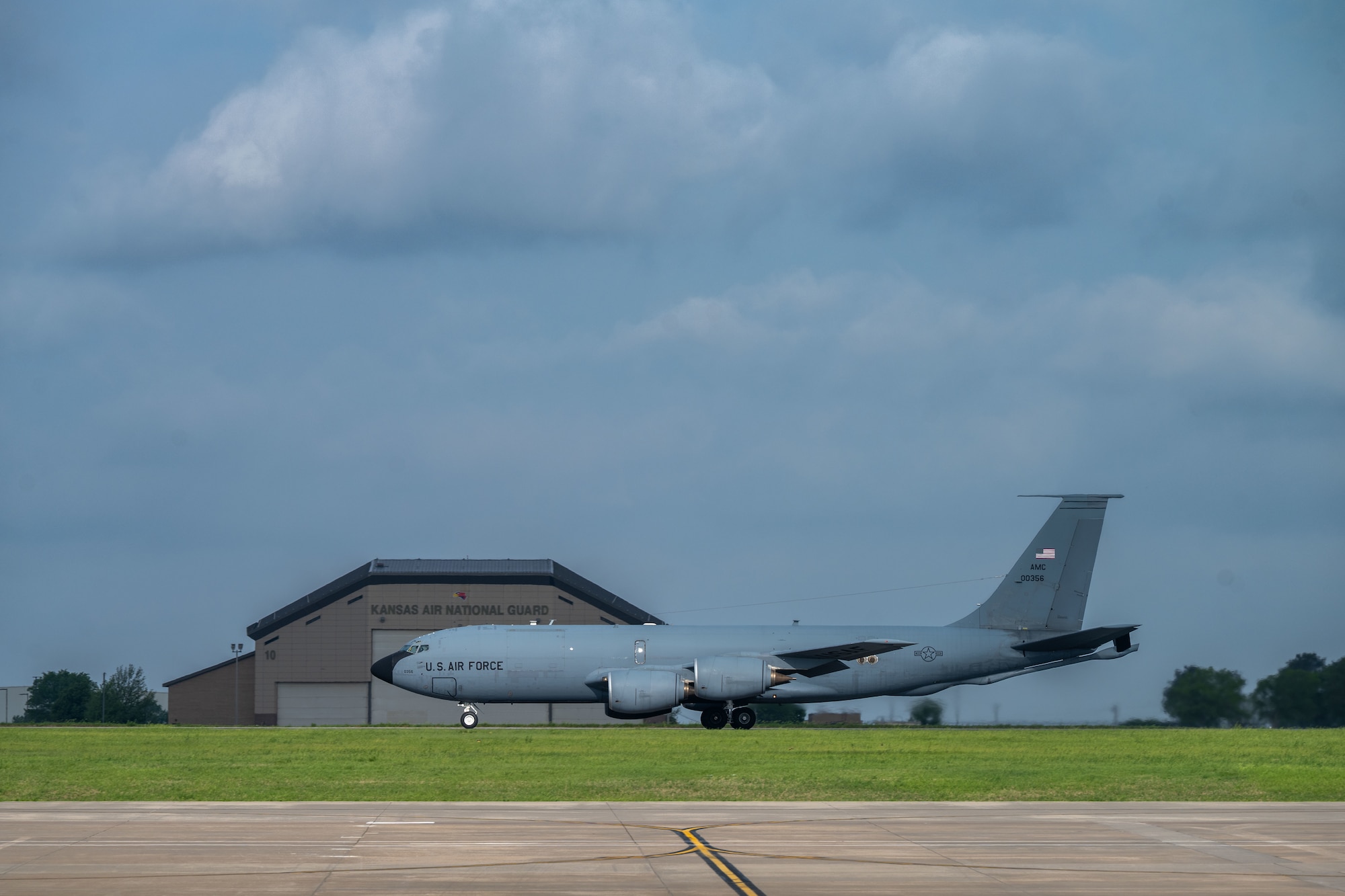 A KC-135 Stratotanker takes off during weather relocation procedures at McConnell Air Force Base, Kansas, April 17, 2026. To protect assets and maintain readiness, the 22nd and 931st Air Refueling Wings temporarily relocated aircraft due to a severe weather forecast. (U.S. Air Force photo by Airman 1st Class Paula Arce)
