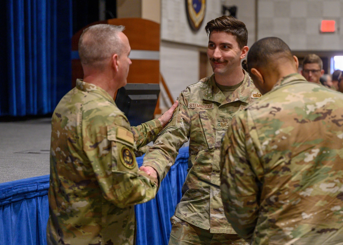 Staff Sgt. Ian Stembridge, Maxwell Air Force Base Religious Affairs, meets Chief Master Sgt. of the Air Force David Wolfe after an all call at Maxwell Air Force Base, Alabama, April 14, 2026