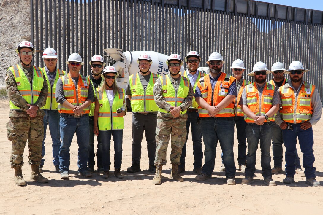 U.S. Army Corps of Engineers South Pacific Border Task Force installs the final border barrier panel at the Barry M. Goldwater Range, or BMGR-1, project site April 15 near Yuma, Arizona. USACE is replacing permanent border barriers along the southern border of the U.S. at the direction of the U.S. Army by the Secretary of War, in response to the presidential national emergency declaration dated Jan. 20, 2025, authorizing the use of Section 2803 of Title 10, U.S. Code.
