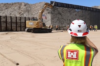 U.S. Army Corps of Engineers South Pacific Border Task Force installs the final border barrier panel at the Barry M. Goldwater Range, or BMGR-1, project site April 15 near Yuma, Arizona. USACE is replacing permanent border barriers along the southern border of the U.S. at the direction of the U.S. Army by the Secretary of War, in response to the presidential national emergency declaration dated Jan. 20, 2025, authorizing the use of Section 2803 of Title 10, U.S. Code.