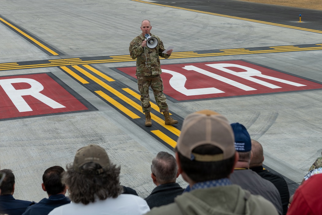 Wing commander delivers remarks during ribbon cutting ceremony
