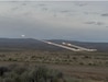 A High Mobility Artillery Rocket System (HIMARS) fires a rocket during a live-fire exercise at Yakima Training Center, Washington, April 20, 2026.