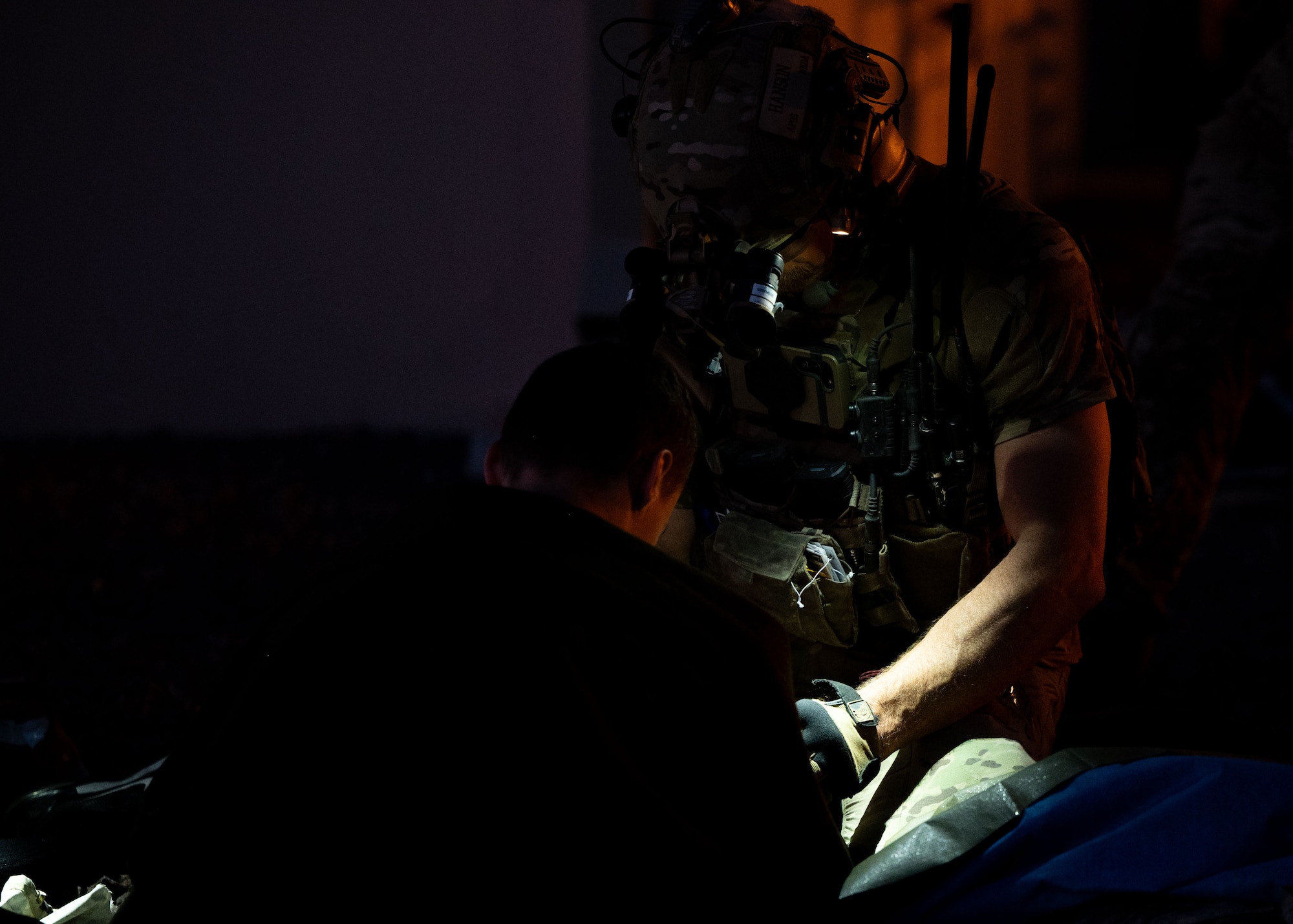 A U.S. Air Force Pararescueman assigned to the 68th Rescue Squadron provides medical care to a simulated casualty during the Combat Leader Course at Davis-Monthan Air Force Base, Arizona, April 17, 2026. The CLC is a rigorous training course that helps Pararescuemen hone skills key to success under duress in combat situations. (U.S. Air Force photo by Airman Najzee Kuzu)