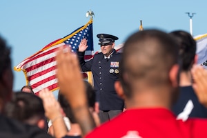 U.S. Space Force Col. Brian Chatman, Space Launch Delta 45 commander, delivers the oath of enlistment during the 2026 Enlistment Ceremony of the Space Coast at Viera High School Stadium in Melbourne, Fla., April 17, 2026. Nearly 250 enlistees officially committed to serve in the U.S. military during the ceremony, which brought together families, educators and community leaders from across Brevard County. (U.S. Space Force photo by Gwendolyn Kurzen).