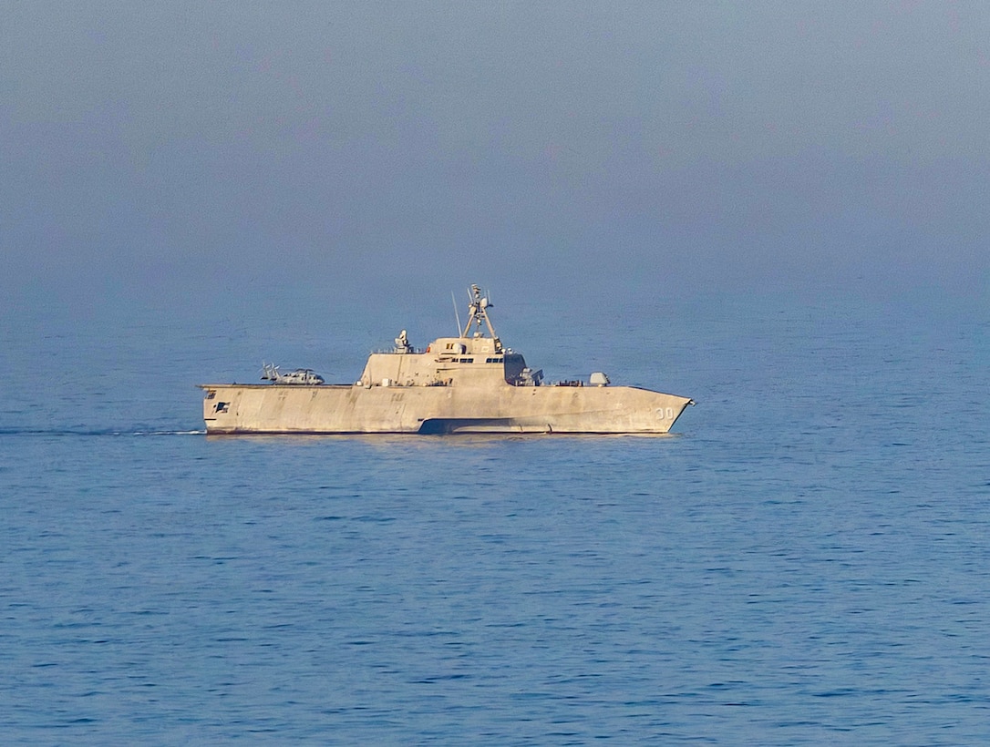 The Independence-class littoral combat ship USS Canberra (LCS 30) patrols the Arabian Sea during a maritime blockade against ships entering or exiting Iranian ports and coastal areas, April 17, 2026. (U.S. Navy photo)