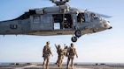 U.S. Sailors and Marines conduct live-hoist training with an MH-60S Sea Hawk helicopter, attached to Helicopter Sea Combat Squadron (HSC) 25, on the flight deck of America-class amphibious assault ship USS Tripoli (LHA 7), April 15, 2026. Tripoli is deployed to the U.S. 5th Fleet area of operations to support maritime security and stability in the Middle East. (U.S. Navy photo)