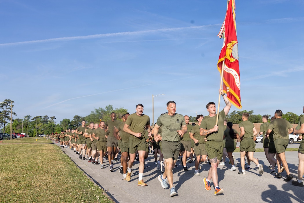 U.S. Marines with 2nd Marine Division participate in a motivational run for the Division's 85th anniversary on Marine Corps Base Camp Lejeune, North Carolina, April. 16, 2026. 2nd MARDIV's unit run reflects esprit de corps and camaraderie within the units and pays homage to the service and sacrifice of Marines and Sailors, both past and present. (U.S. Marine Corps photo by Lance Cpl Francis Hrosar)