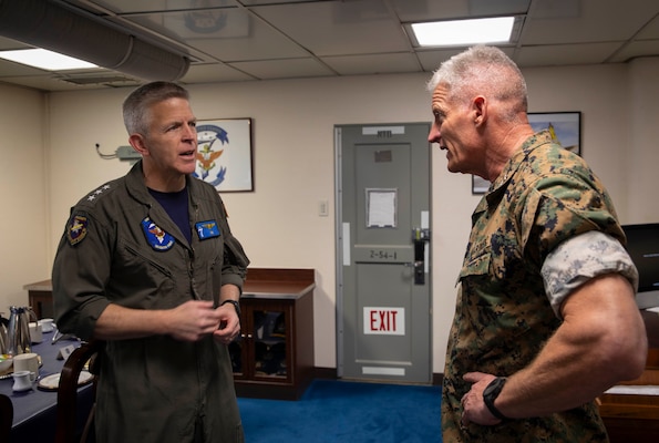 U.S. 7th Fleet Commander Vice Adm. Pat Hannifin, left, meets with U.S. Marine Corps Lt. Gen. Roger B. Turner, commanding general, III Marine Expeditionary Force, aboard U.S. 7th Fleet flagship USS Blue Ridge during a scheduled port visit in Okinawa, Japan, April 20, 2026.