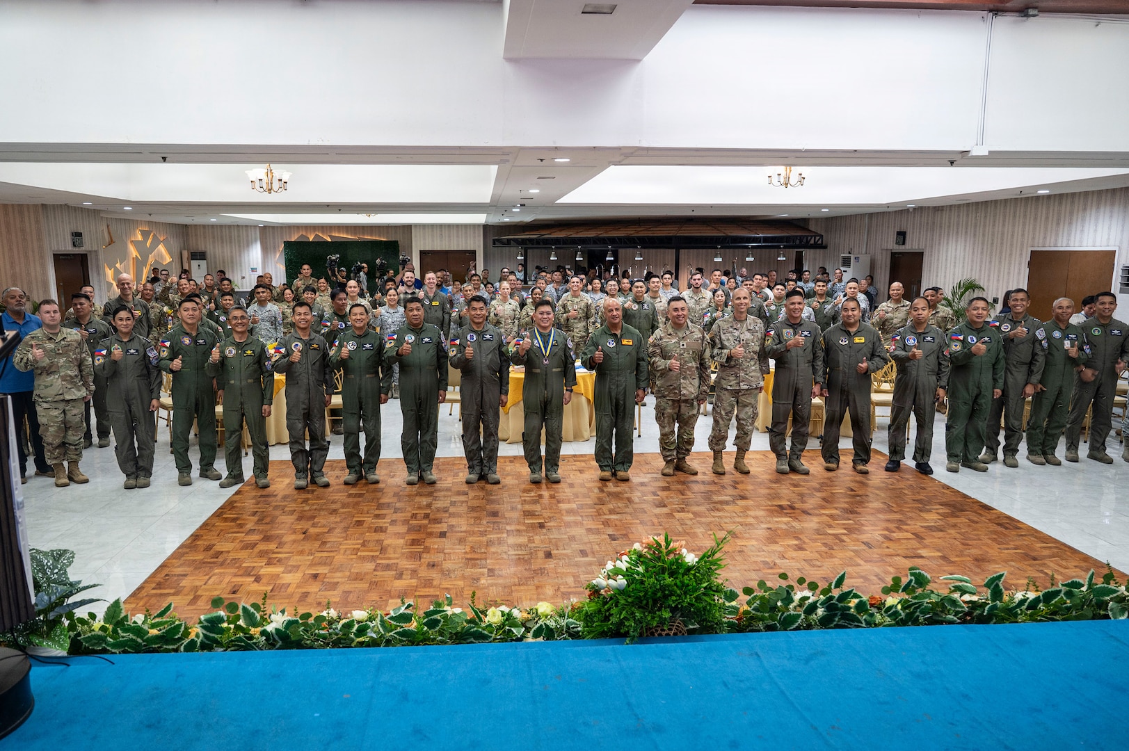 Exercise Cope Thunder 26-1 participants pose for a group photo after the opening ceremony at Clark Air Base, Philippines, April 6, 2026.
