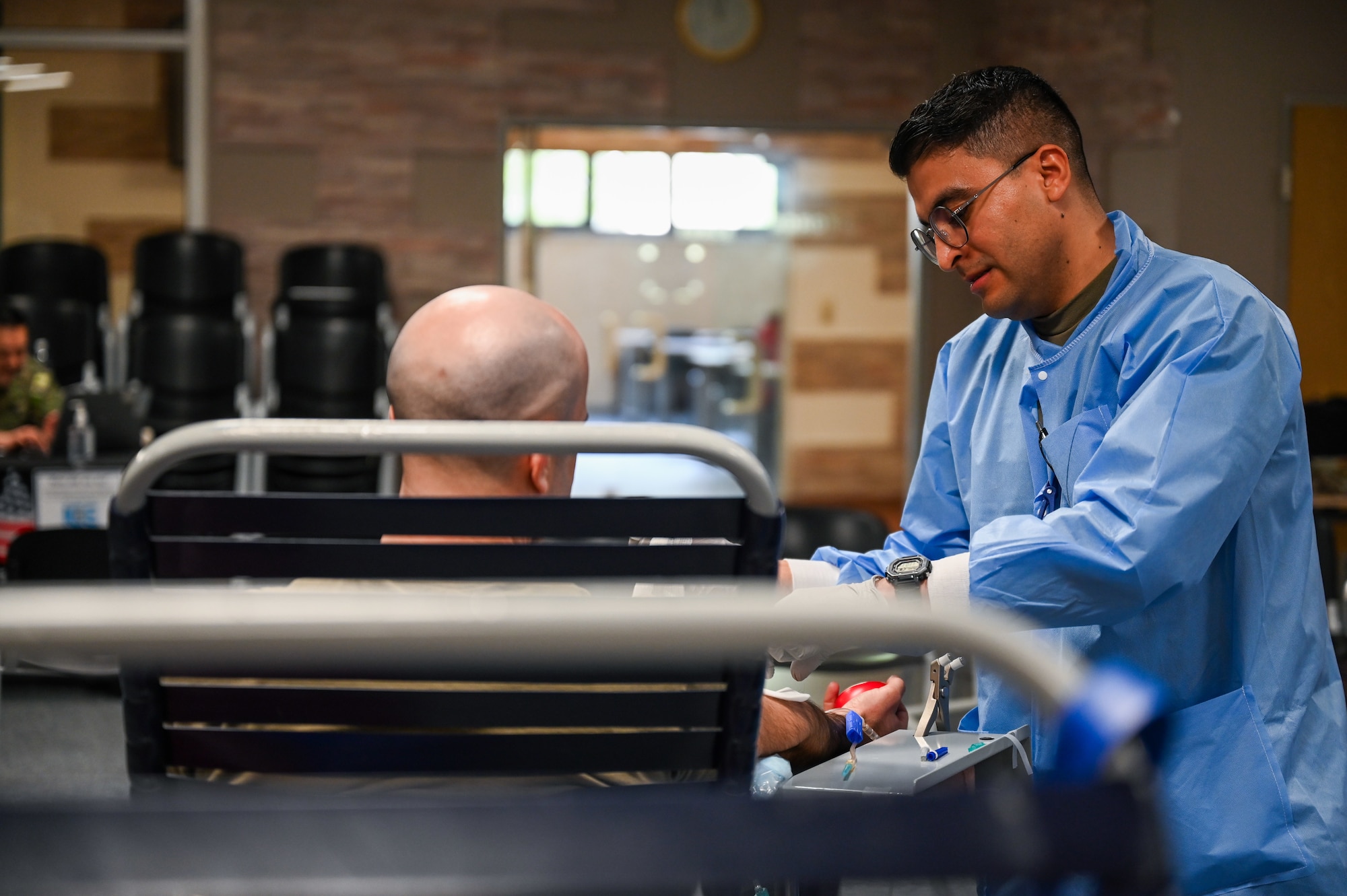 A donor donates blood during a blood drive at Ramstein Air Base, Germany, April 20, 2026.