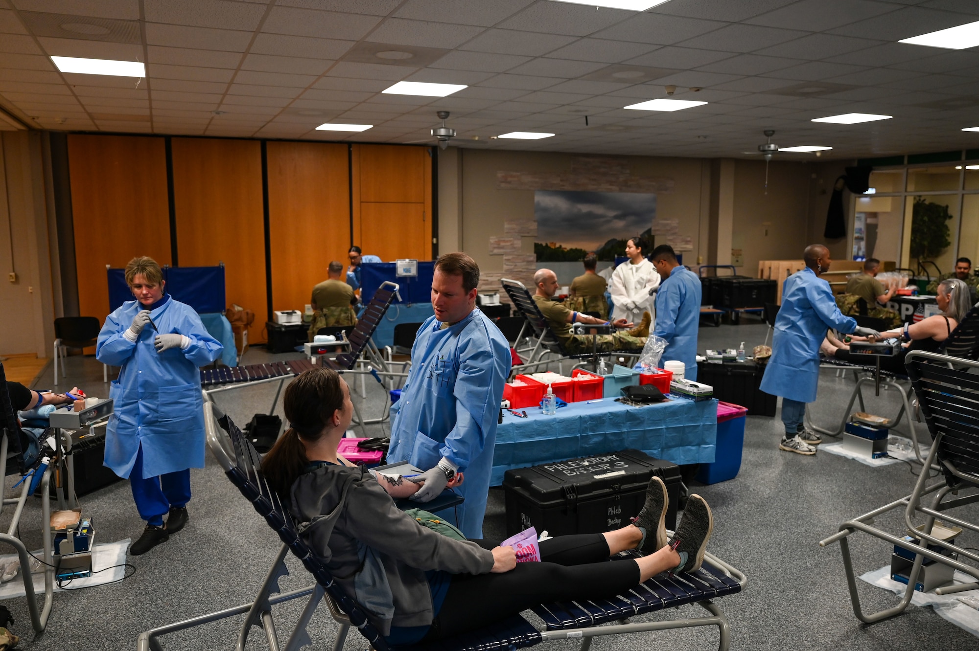 Donors donate blood with the help of healthcare workers during a blood drive at Ramstein Air Base, Germany, April 20, 2026.