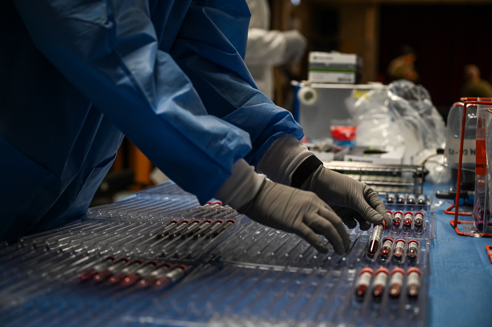 Ashten Welle, Global Shield Health Consultants contractor, helps organize donated blood at Ramstein Air Base, Germany, April 20, 2026.