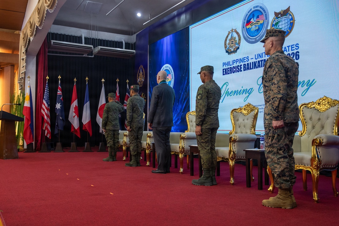 From right to left, U.S. Marine Corps Lt. Gen. Christian F. Wortman, commanding general of the U.S. joint task force; Philippine Army Maj. Gen. Elmer B. Suderio, deputy chief of staff for operations of the Armed Forces of the Philippines; Mr. Y. Robert Ewing, U.S. Chargé d’Affaires, a.i.,; Philippine Army Gen. Romeo Brawner Jr., Chief of Staff of the Armed Forces of the Philippines; and Philippine Army Maj. Gen. Francisco F. Lorenzo Jr., Philippine exercise director, render a salute to partner nation flags while both the Philippine and the U.S. national anthems are played during the opening ceremony of Exercise Balikatan 2026 at Camp General Emilio Aguinaldo, Manila, Philippine, April 20, 2026. Balikatan is a longstanding annual exercise between the AFP and U.S. military designed to strengthen our ironclad alliance, improve our capable combined force, and demonstrate our commitment to regional security and stability. (U.S. Army photo by Sgt. Sar Paw)