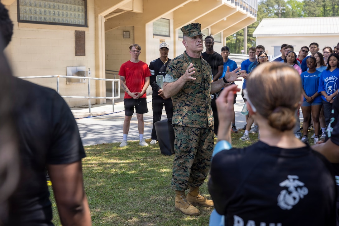 U.S. Marine Corps Brig. Gen. Ralph J. Rizzo, Jr., commanding general, Marine Corps Installations East-Marine Corps Base (MCIEAST-MCB) Camp Lejeune, speaks about the importance of administrative specialists in the Marine Corps after presenting the 2025 Personnel Administration Center of the Year Award to the Marines and civilians with the MCIEAST Regional Personnel Administration Center at MCB Camp Lejeune, North Carolina, April 16, 2026. MCIEAST RPAC won this award for its efficient and accurate administrative, pay, and reporting support across multiple installations, ensuring that Marines' records were properly maintained and they remained ready for worldwide deployment. (U.S. Marine Corps photo by Cpl. Jessica J. Mazzamuto)