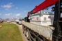 a fuel tank sits on the back of a flatbed truck