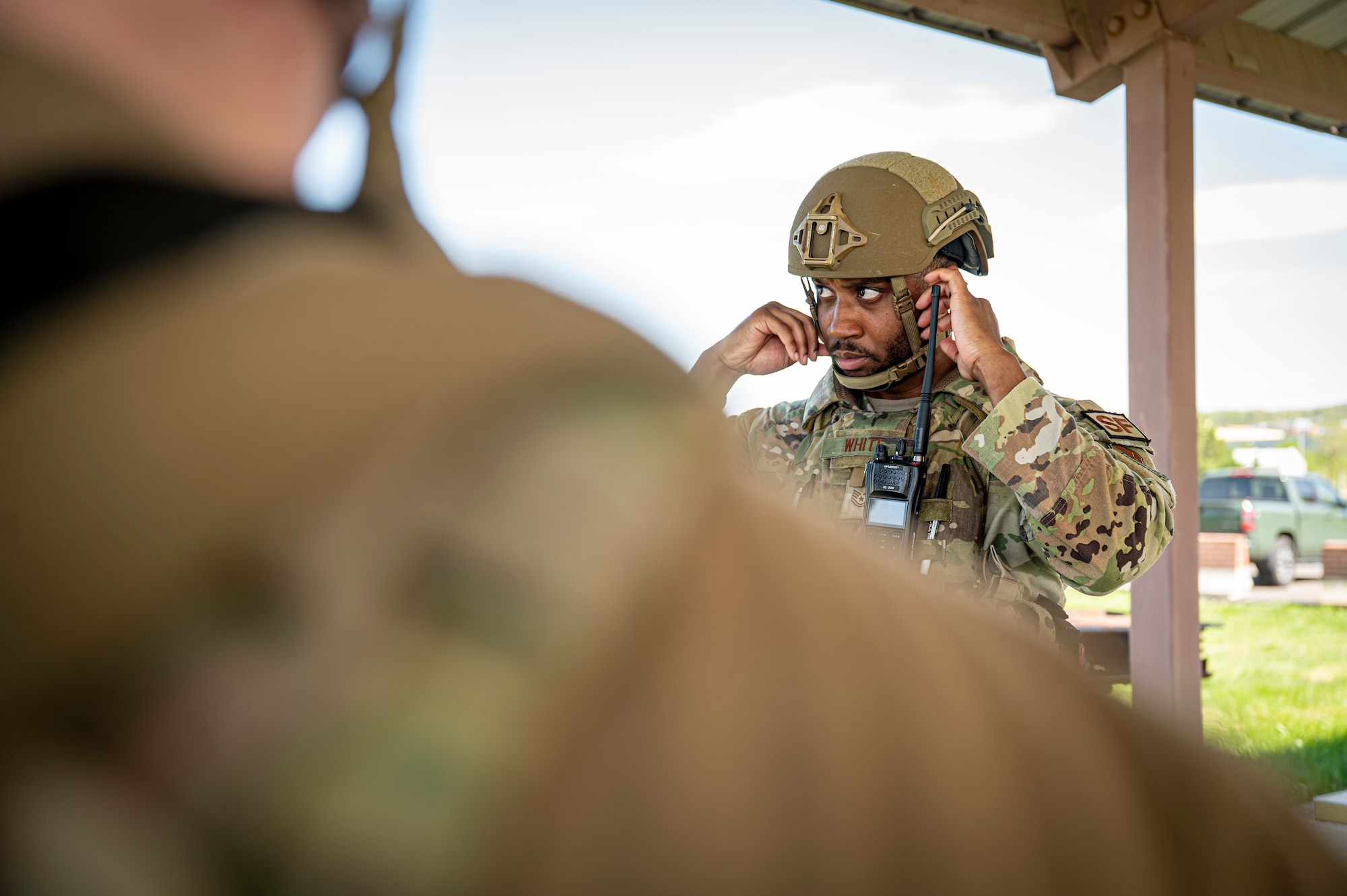 U.S. Air Force Tech. Sgt. Terence White, base defense operations controller with the 11th Security Forces Squadron, briefs the team on combat strategies at Joint Base Anacostia-Bolling, Washington, D.C., April 14, 2026. The training emphasized communication strategies and threat response to increase combat readiness. (U.S. Air Force photo by Senior Airman Shanel Toussaint)