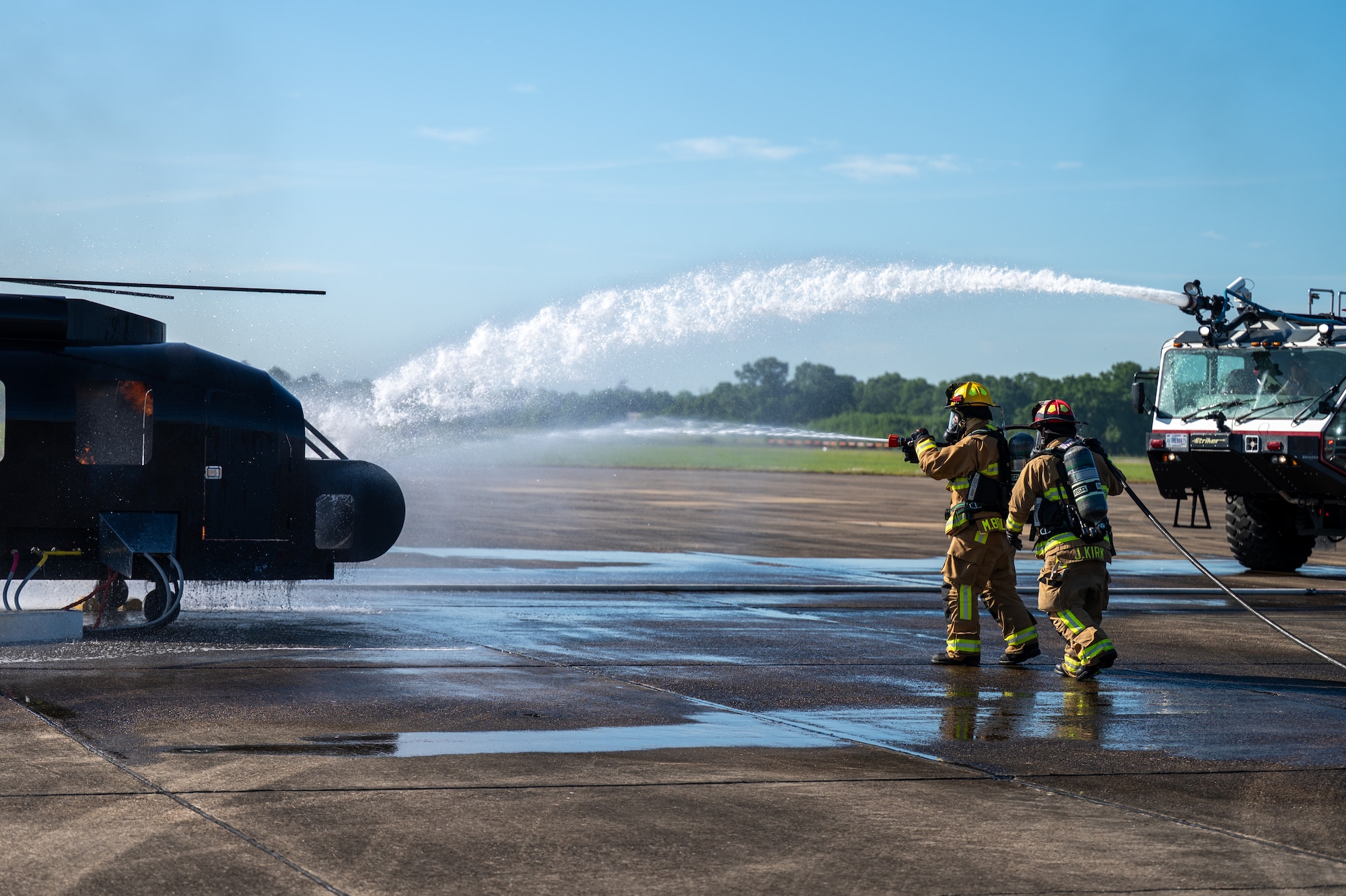 Firefighters assigned to the 42d Civil Engineer Squadron respond to a simulated downed aircraft at Maxwell Air Force Base, Alabama, April 16, 2026. The simulation was designed to test the response of emergency personnel at Maxwell. (U.S. Air Force photo by Staff Sgt. Evan Porter)