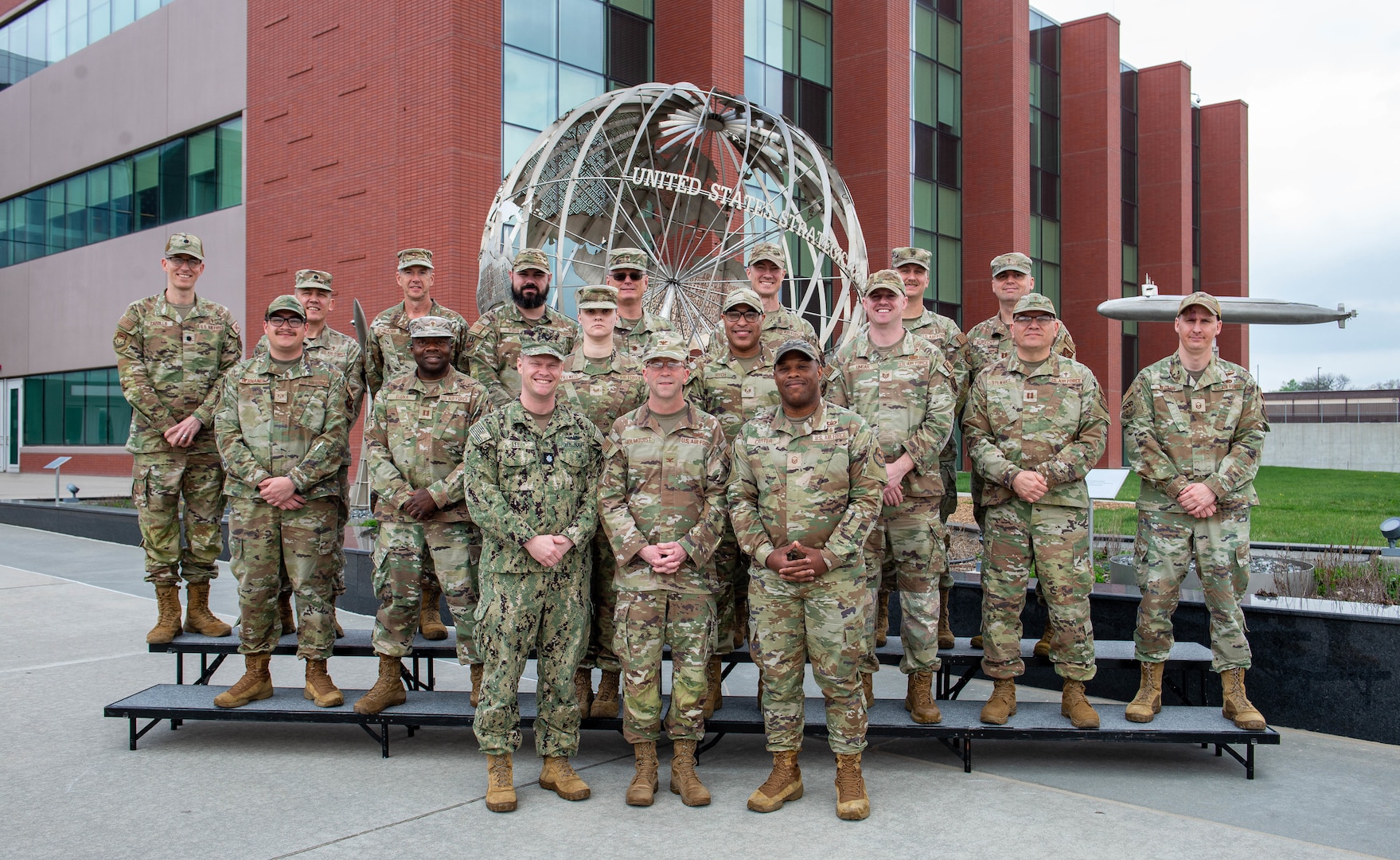 Chaplains from multiple U.S. Strategic Command component commands pose for a photo during a religious affairs readiness workshop at USSTRATCOM headquarters, on Offutt Air Force Base, April 15, 2026.