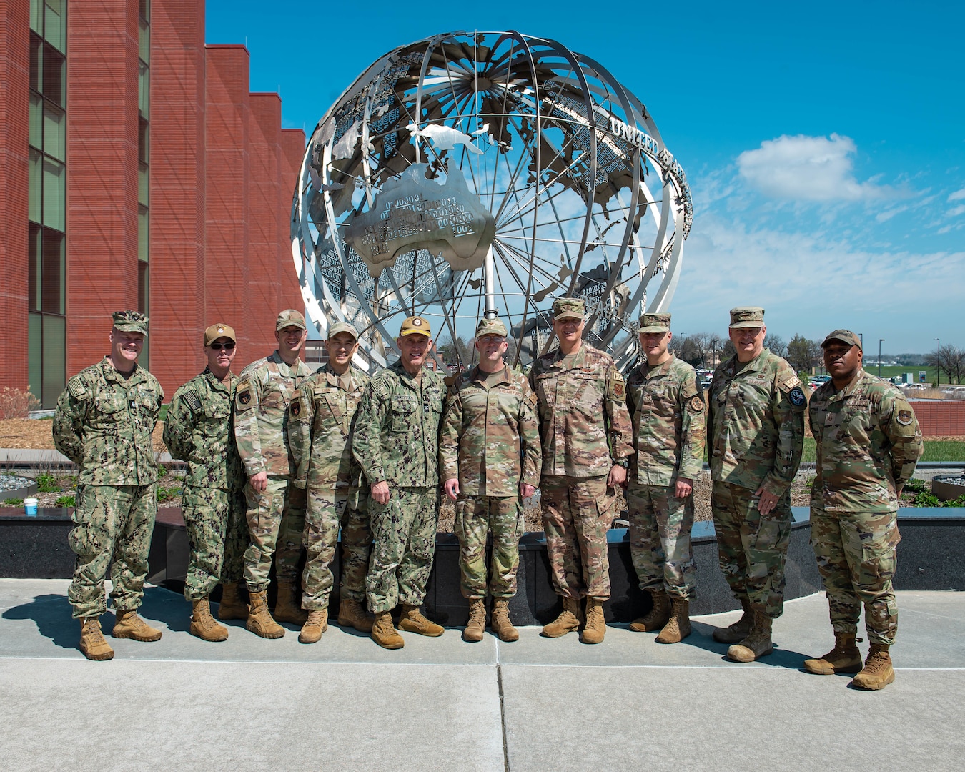 Chaplains from multiple U.S. unified combatant commands pose for a photo during a religious affairs readiness workshop at U.S. Strategic Command headquarters, on Offutt Air Force Base, April 14, 2026.