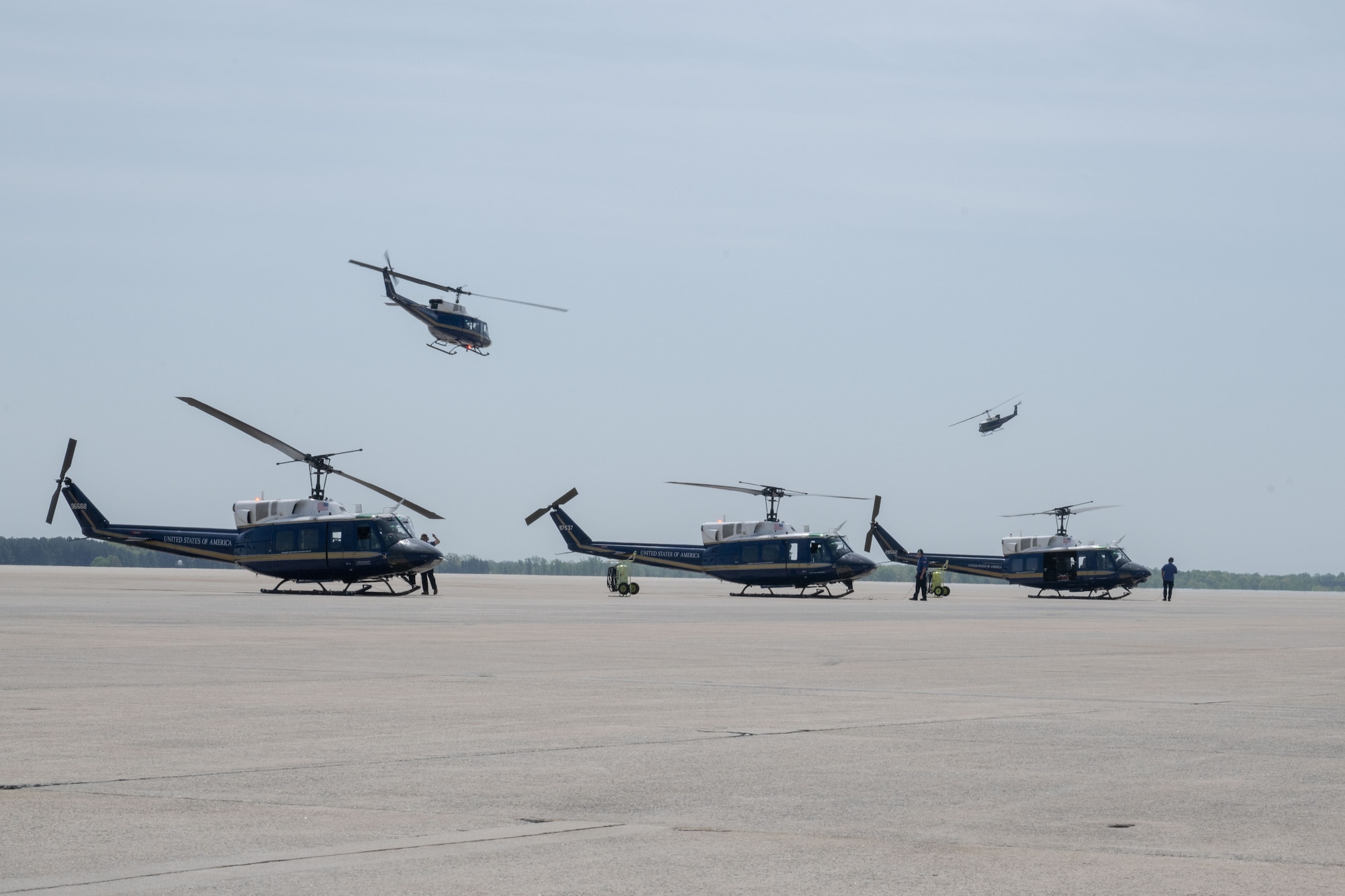 3 helicopters on the ground