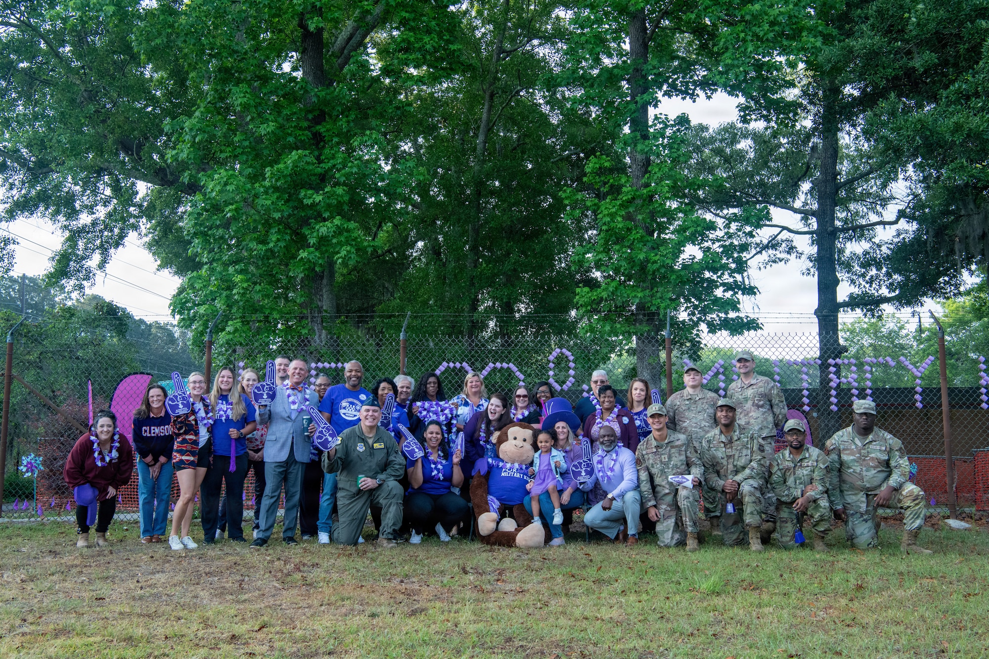 Joint base community poses for a group photo.