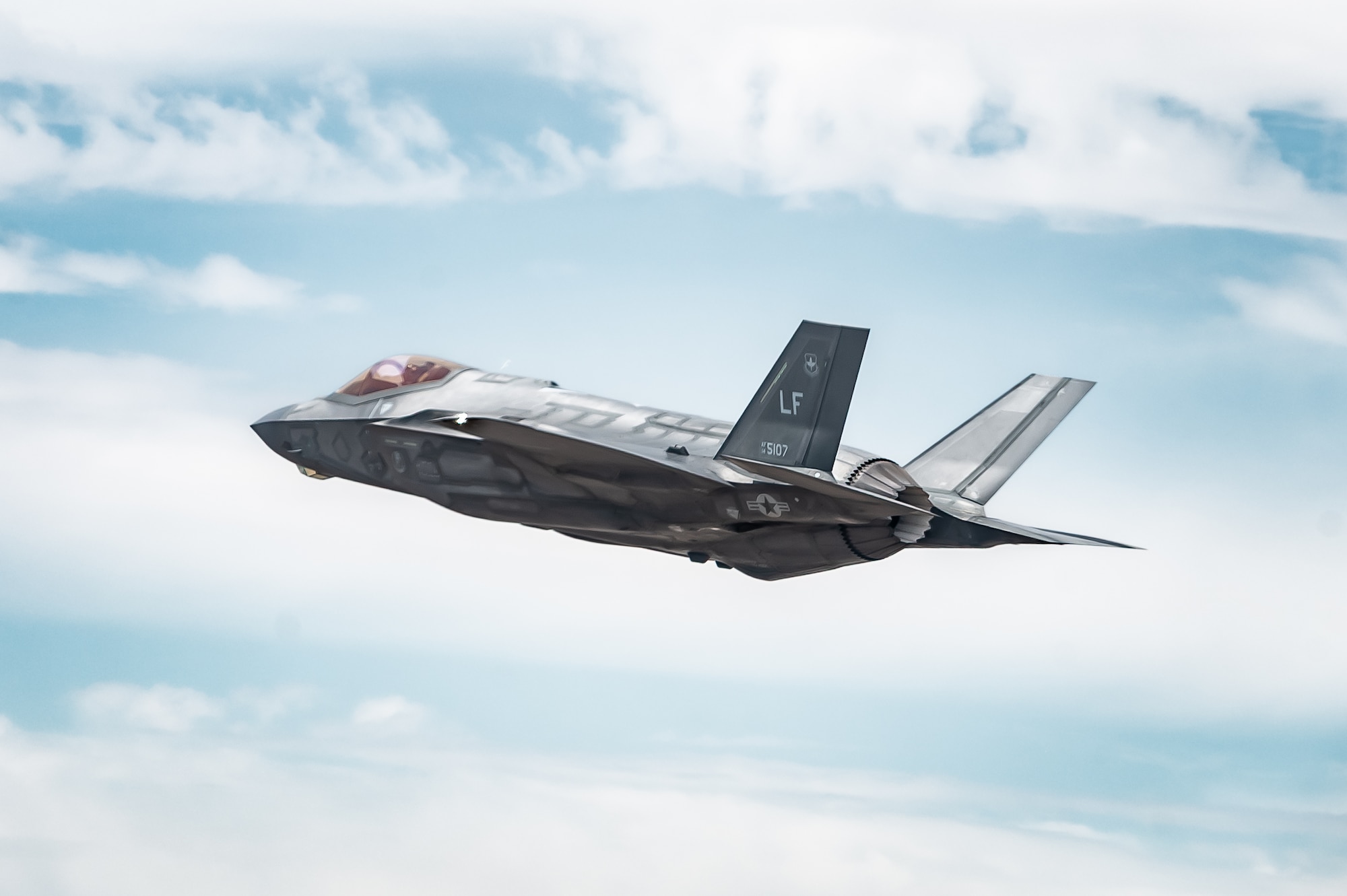 A U.S. Air Force F-35A Lightning II assigned to the 62nd Fighter Squadron flies over the Sonoran Desert