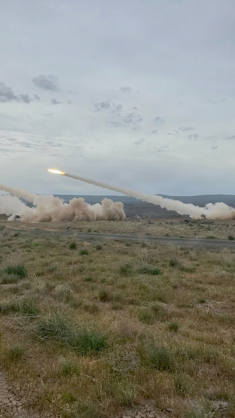 A High Mobility Artillery Rocket System (HIMARS) fires a rocket during a live-fire exercise at Yakima Training Center, Washington, April 20, 2026. The exercise demonstrated long-range precision fires capabilities in support of unit readiness and mission effectiveness.