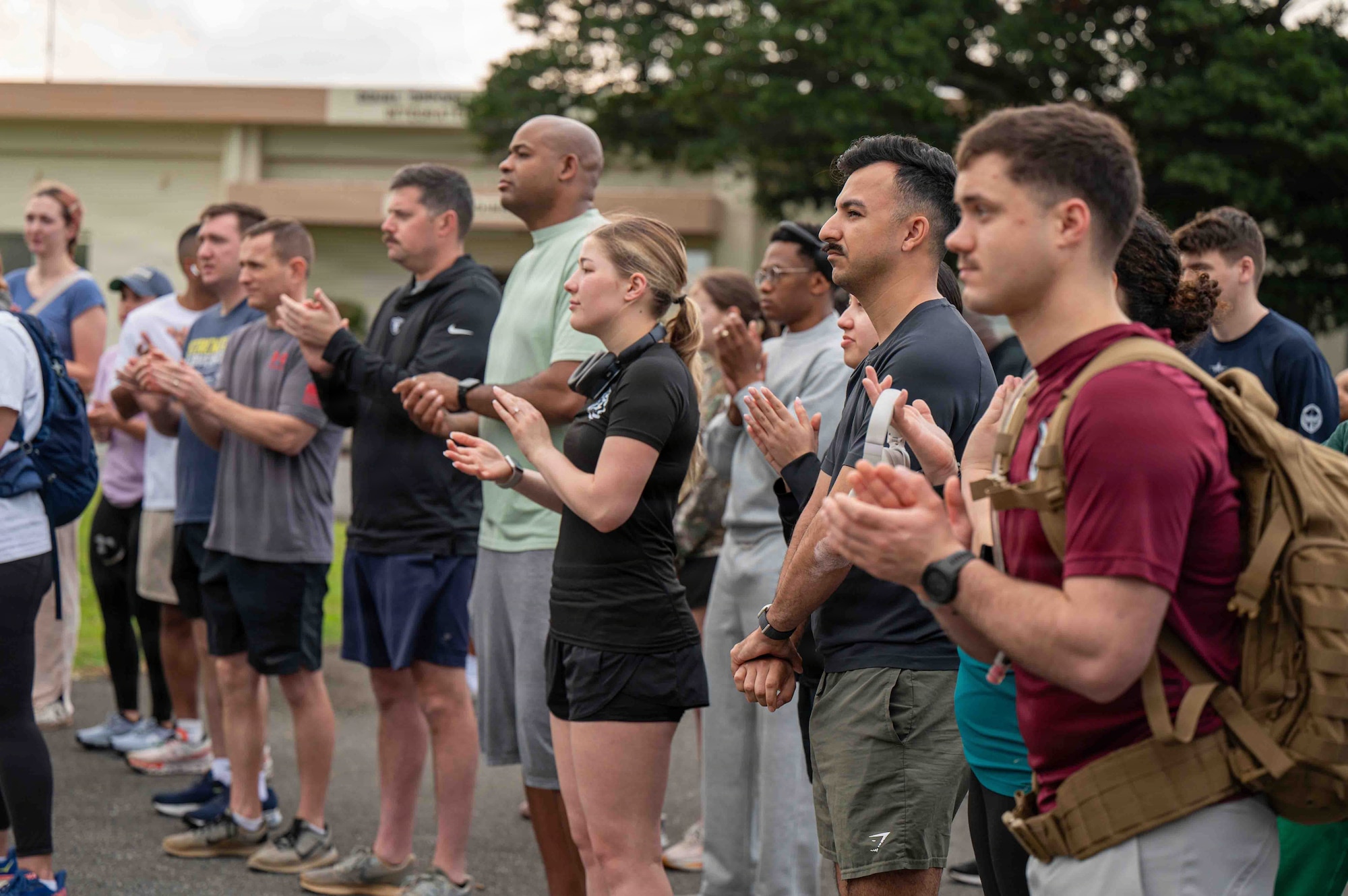 Service members listen to speech.