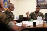 U.S. Navy Rear Adm. Guido Valdes, the Medical Officer of the Marine Corps, listens to Marine Corps Col. David Merles, commanding officer of Blount Island Command, during a brief on Marine Corps prepositioning programs April 22, 2026, at Marine Corps Support Facility Blount Island, Florida. The Marine Corps’ senior medical advisor and health services director visited the command to gain ground-level insight into prepositioned medical capabilities supporting global operations. (Marine Corps photo by Dustin Senger)