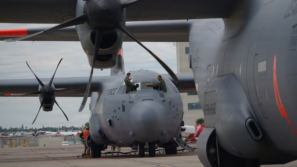 Airmen from the 146th Airlift Wing, 152nd Airlift Wing and the 302nd Airlift Wing train alongside CAL FIRE ground crews during their annual Modular Airborne Firefighting System, or MAFFS, recertification training at McClellan Air Tanker Base, Sacramento, Calif., April 20, 2026.