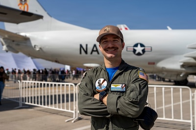 U.S. Navy Lt. Ethan White, Patrol Squadron Thirty P-8A Poseidon aircraft commander poses for a photo during Feria Internacional del Aire y del Espacio (FIDAE) 2026 in Santiago, Chile, April , 2026. FIDAE is one of the largest air and space defense exhibitions in Latin America, bringing together military leaders, industry partners, and aviation professionals from around the world. (U.S. Air Force photo by Andrea Jenkins)