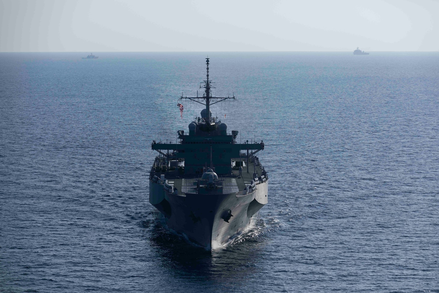 U.S. 7th Fleet flagship USS Blue Ridge (LCC 19), center, Philippine Coast Guard Boracay-class patrol boat BRP Boracay (FPB-2401), left, and U.S. Navy Whidbey Island-class dock landing ship USS Ashland (LSD 48), right, participate in a group sail during a multilateral exercise with the Armed Forces of the Philippines and Royal Australian Navy in the Sulu Sea, April 13, 2026. U.S. 7th Fleet, the U.S. Navy’s largest forward-deployed numbered fleet, routinely interacts and operates with allies and partners in preserving a free and open Indo-Pacific. (U.S. Navy photo by Mass Communication Specialist 1st Class Charles Oki)