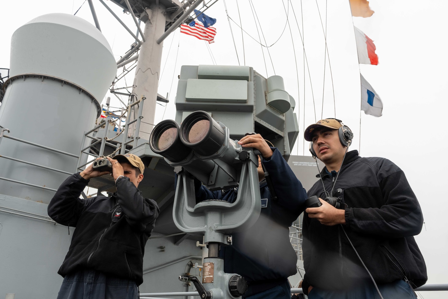 Sailors stand watch on the bridge wing aboard U.S. 7th Fleet flagship USS Blue Ridge (LCC 19) as the ship returns to Commander, Fleet Activities Yokosuka, Japan following a patrol in the Indo-Pacific region, April 23, 2026.