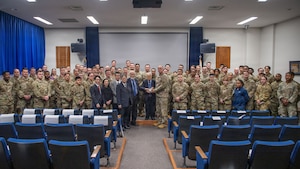A group of people pose for a photo.