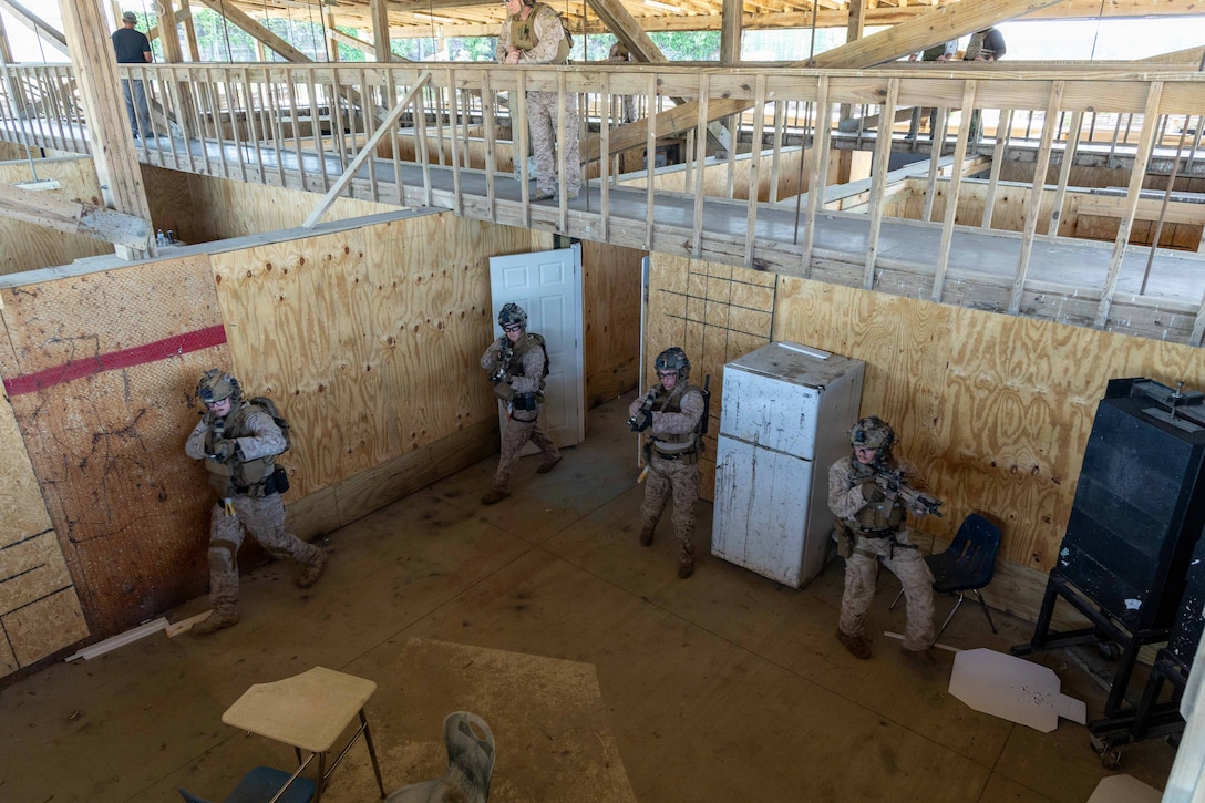 U.S. Marines with Maritime Raid Force, 24th Marine Expeditionary Unit, clear a room while conducting close-quarters tactics training in Marion, Arkansas, April 14, 2026. The training at Tier 1 Group enhanced MRF’s knowledge of weapons and tactics, breaching, operational medicine, and lethality in preparation for the 24th MEU’s upcoming deployment. (U.S. Marine Corps photo by Cpl. Daniel R. Garcia)