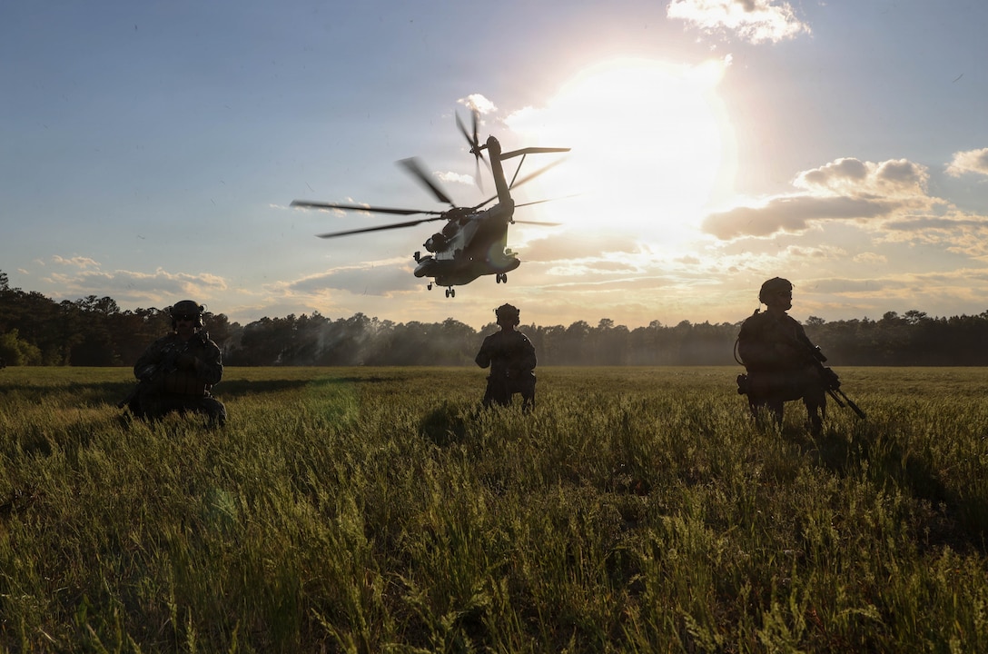 U.S. Marines with 2nd Combat Engineer Battalion, 2nd Marine Division, post security during a helo insertion as part of a Marine Corps Combat Readiness Evaluation on Marine Corps Base Camp Lejeune, North Carolina, April 20, 2026. Marines participated in a MCCRE to be evaluated on unit combat readiness and ability to execute mission critical tasks in preparation for future operations and deployments. (U.S. Marine Corps photo by Lance Cpl. Brian Michalski)
