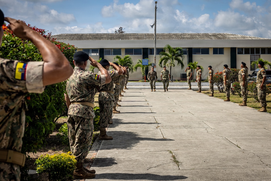 U.S. Marine Corps Lt. Col. Mark Paige, commanding officer of Battalion Landing Team 3/6, 22nd Marine Expeditionary Unit (Special Operations Capable), left, and Capt. Byron Herrera Montaño, commander of  Infanteria de Marina Jaramijo, march during a bilateral exercise opening ceremony on Naval Base Jaramijó, Ecuador, April 17, 2026. The 22nd MEU(SOC)’s Ecuador bilateral training enhances interoperability with partner forces, reinforces longstanding security relationships, and improves combined readiness to respond to crises across the region. U.S. military forces are deployed to the region in support of U.S. Southern Command mission objectives and the president’s priorities to strengthen regional security, disrupt illicit drug trafficking, and protect the U.S. homeland. (U.S. Marine Corps photo)