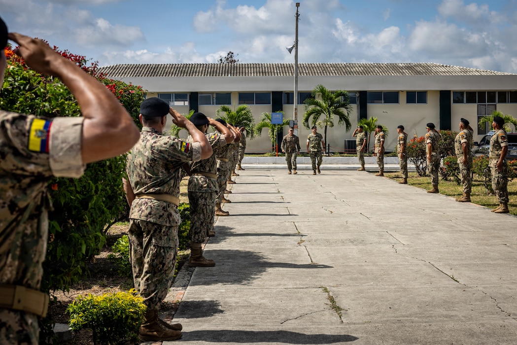 U.S. Marine Corps Lt. Col. Mark Paige, commanding officer of Battalion Landing Team 3/6, 22nd Marine Expeditionary Unit (Special Operations Capable), left, and Capt. Byron Herrera Montaño, commander of  Infanteria de Marina Jaramijo, march during a bilateral exercise opening ceremony on Naval Base Jaramijó, Ecuador, April 17, 2026. The 22nd MEU(SOC)’s Ecuador bilateral training enhances interoperability with partner forces, reinforces longstanding security relationships, and improves combined readiness to respond to crises across the region. U.S. military forces are deployed to the region in support of U.S. Southern Command mission objectives and the president’s priorities to strengthen regional security, disrupt illicit drug trafficking, and protect the U.S. homeland. (U.S. Marine Corps photo)
