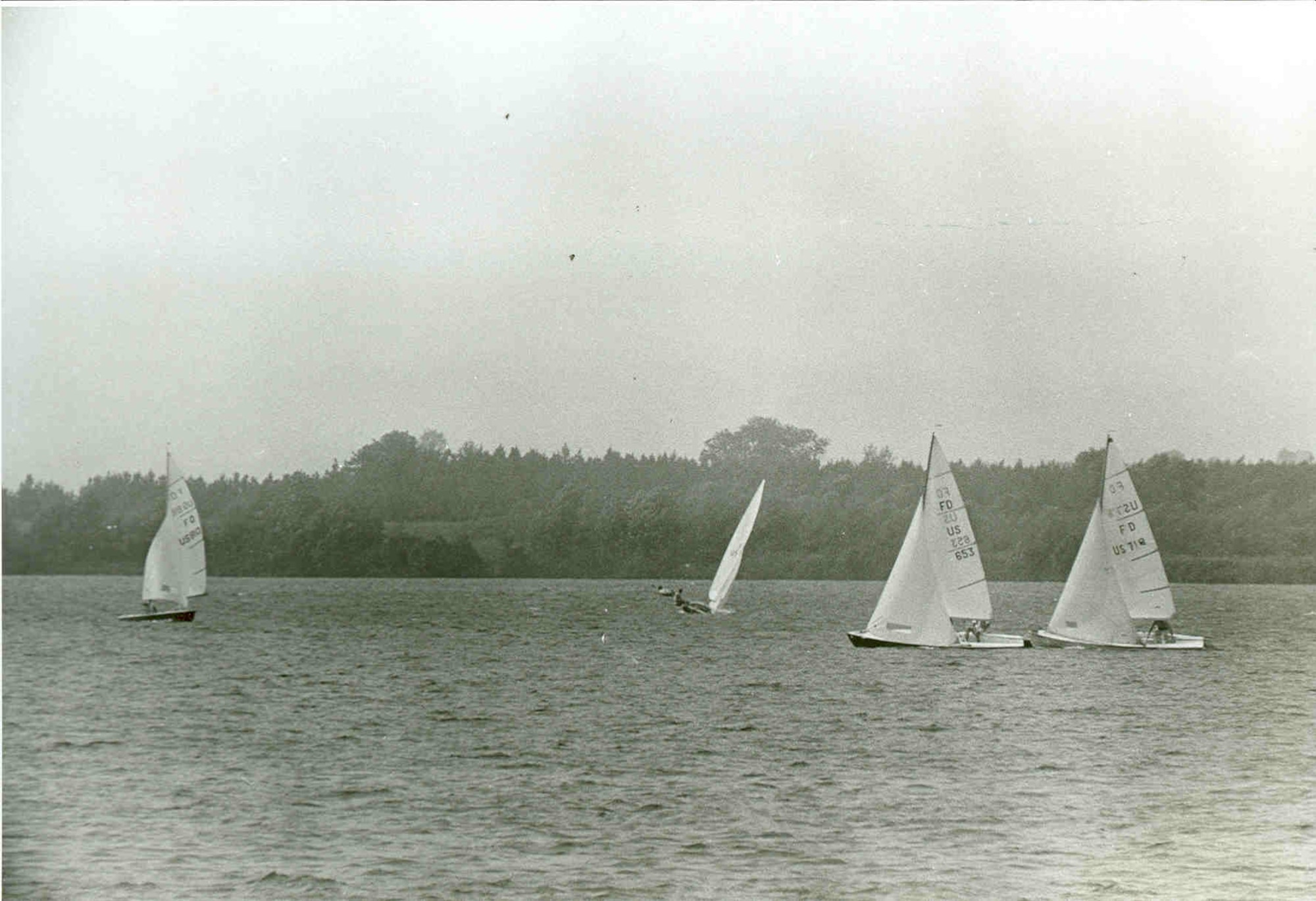 Sailboats navigate the course during the 1968 Highland Yacht Club Regatta on Woods Reservoir. The reservoir, created by the 1952 completion of the Elk River Dam to supply cooling water to Arnold Engineering Development Center test facilities, opened for public fishing and recreation on May 30, 1953. Public use of the manmade lake was a topic of focus for then-AEDC Commander Brig. Gen. Samuel Harris following construction of the dam and leading up to the dedication of the waterbody as Woods Reservoir in July 1953. (U.S. Air Force photo)