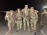 Four Soldiers from Munson Army Health Center pushed their physical and mental limits to earn the prestigious German Armed Forces Proficiency Badge April 16. From left, Spc. Delilah Wells, Sgt. Joseph Stoops, Pfc. Harris Halverstadt, and Pfc. Seth Dunham were among the 29 Soldiers at Fort Leavenworth to qualify for the foreign military award, successfully navigating a grueling series of tests on multiple days.