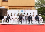 Leaders from the United States and West Africa pose for a group photo during the opening ceremony of Obangame Express 26.