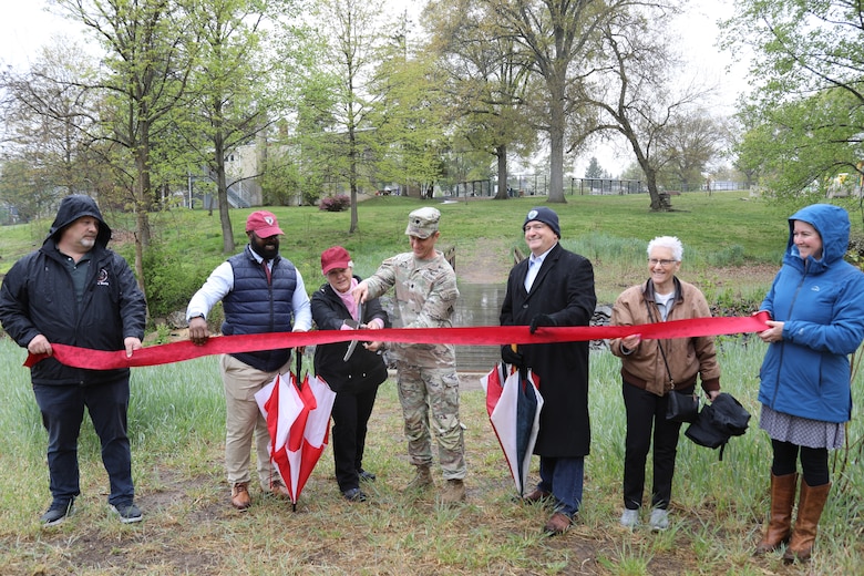 U.S. Army Corps of Engineers Philadelphia District Commander Lt. Colonel Ryan A. Baum cuts the inaugural ribbon at the Abington project grand opening.