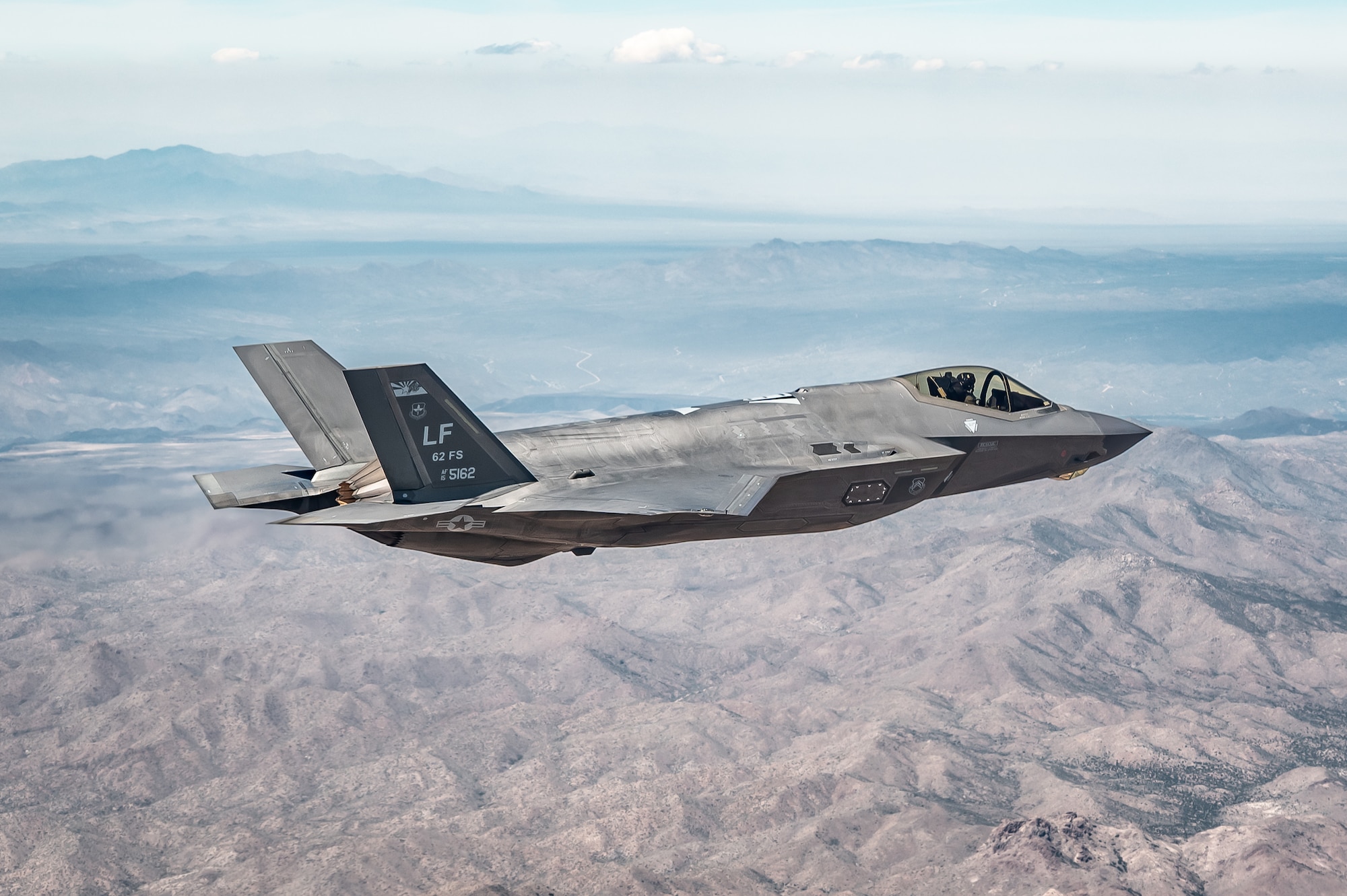 A U.S. Air Force F-35A Lightning II aircraft assigned to the 56th Fighter Wing soars over the Sonoran Desert