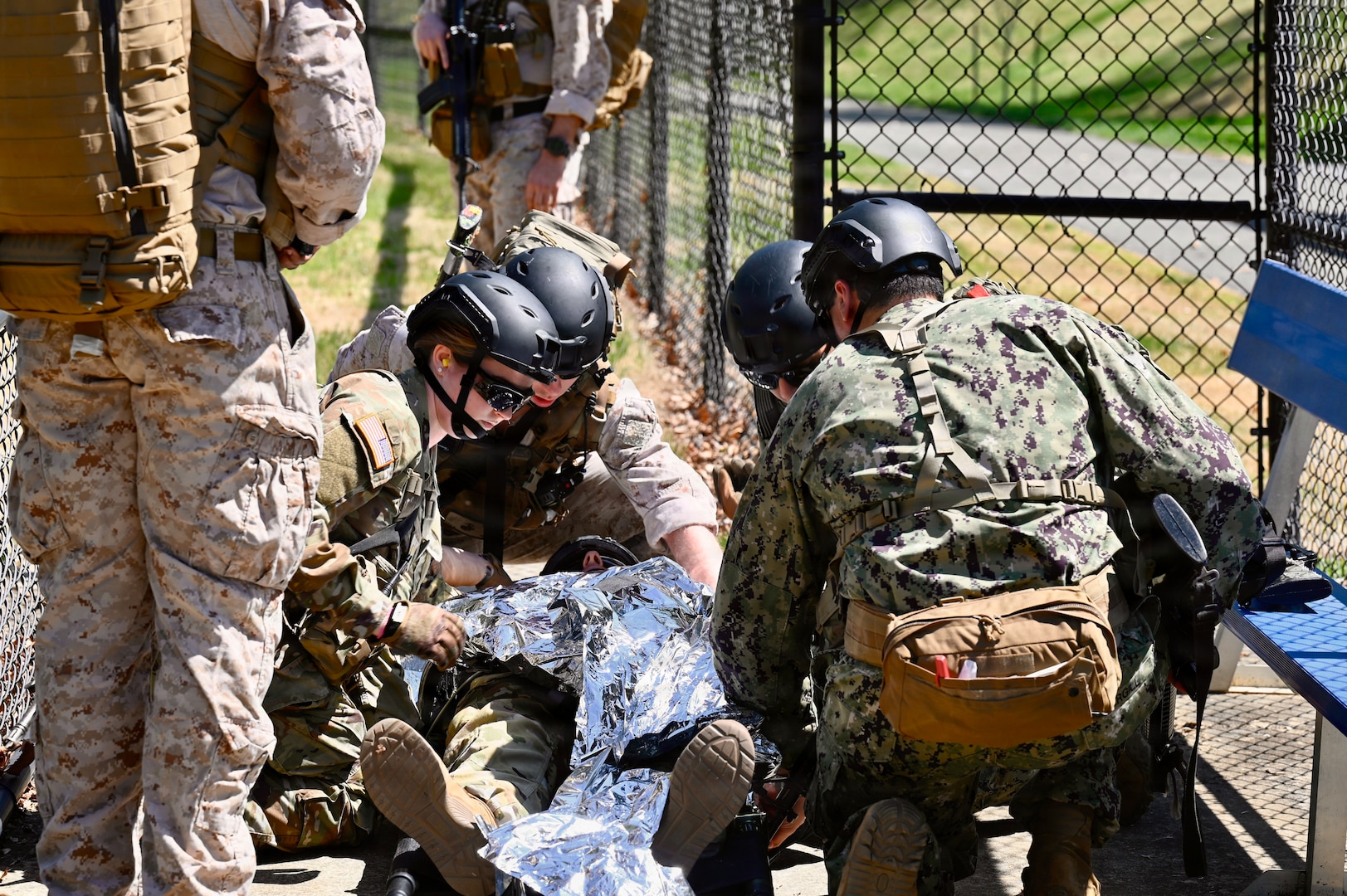 First-year medical students at the Uniformed Services University of the Health Sciences conduct a medical evacuation training exercise with a UH-60L MEDEVAC Black Hawk assigned to the D.C. Army National Guard Aviation Battalion in Bethesda, Maryland, on April 10, 2026. The training provided medical school applicants and first-year medical students with instruction in medical evacuation procedures and tactical combat casualty care (TCCC).