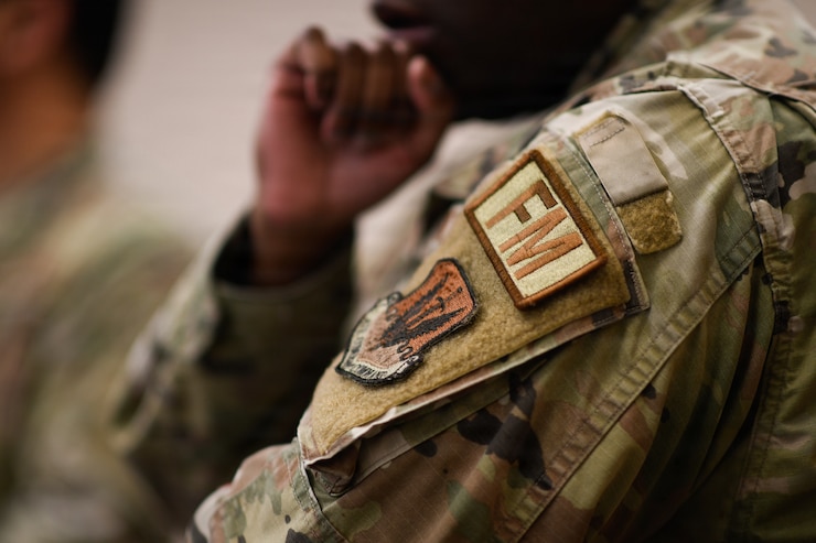 Airman reviewing documents.