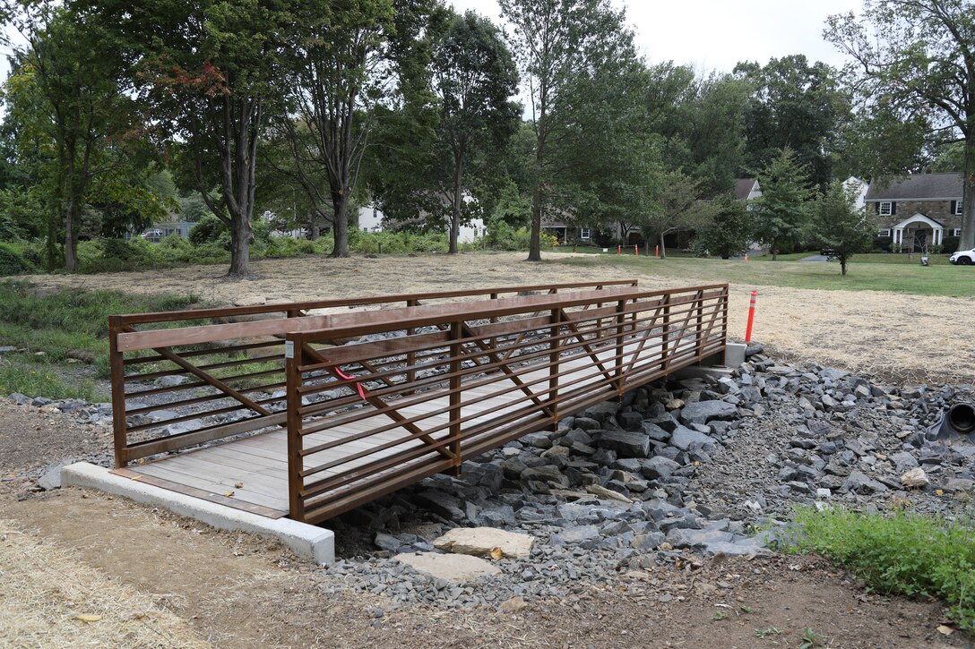 Abington Township photos post-project, showing the completed bridge in Grove Run Dog Park.