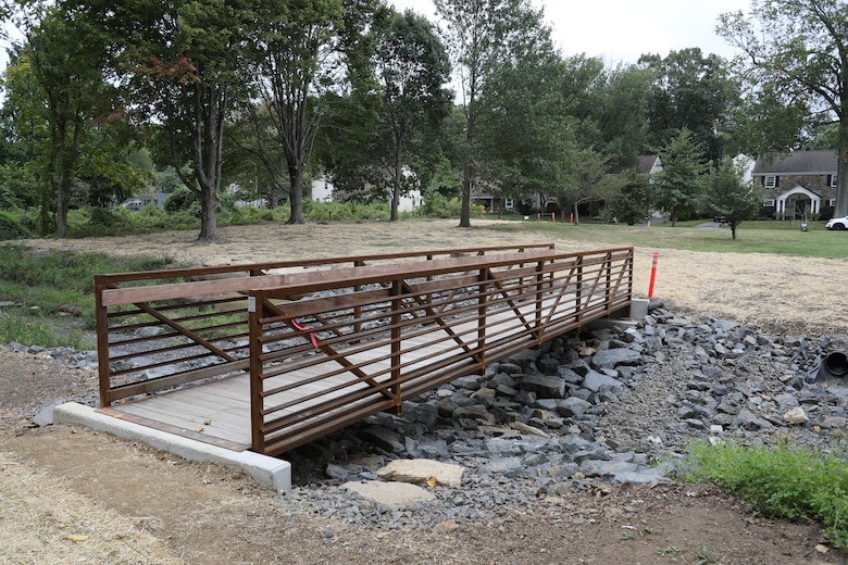 Abington Township photos post-project, showing the completed bridge in Grove Run Dog Park.