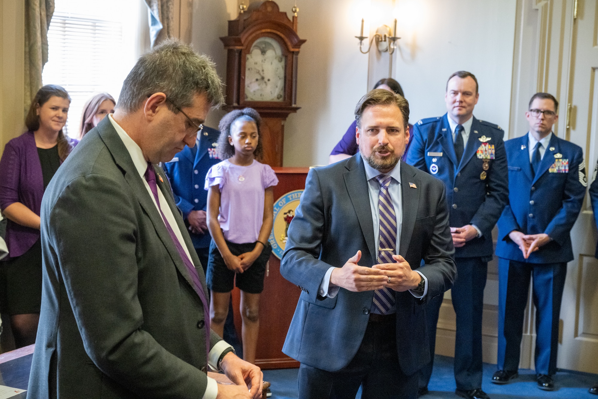 Stephen Simmons, Deputy Assistant Secretary of War for Military Community and Family Policy, speaks to a group of students, parents and faculty from across the state before signing a document proclaiming April as the Month of the Military Child in Dover, Delaware, April 16, 2026. The Month of the Military Child was established in 1986 to recognize the contributions and personal sacrifices children make during their parents’ service in the armed forces. (U.S. Air Force photo by Mauricio Campino)