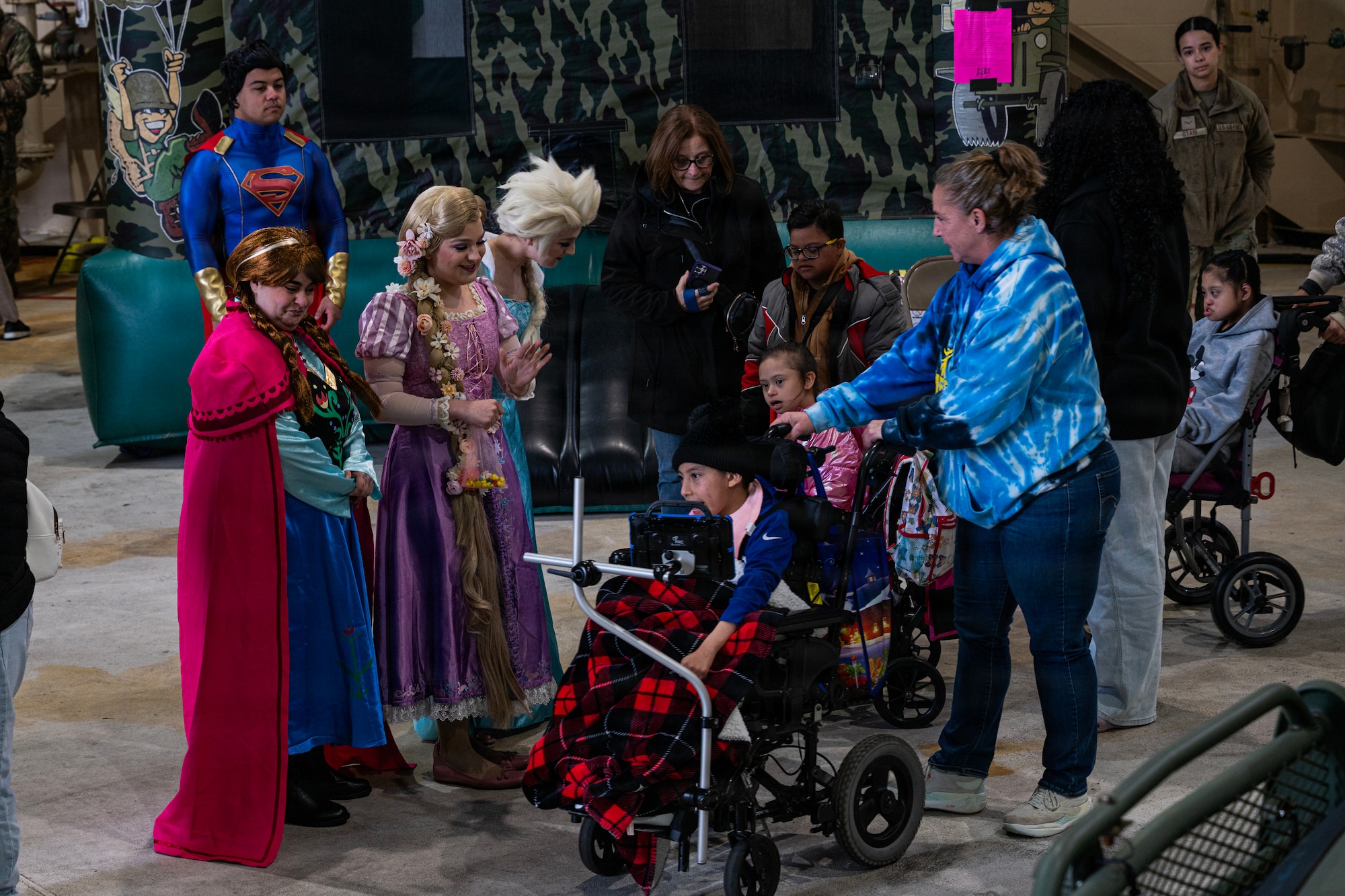 Students and faculty members of Mercer County Special Services School District greet character actors at the Special Needs Airshow, April 2, 2026 at Joint Base McGuire-Dix-Lakehurst, New Jersey.