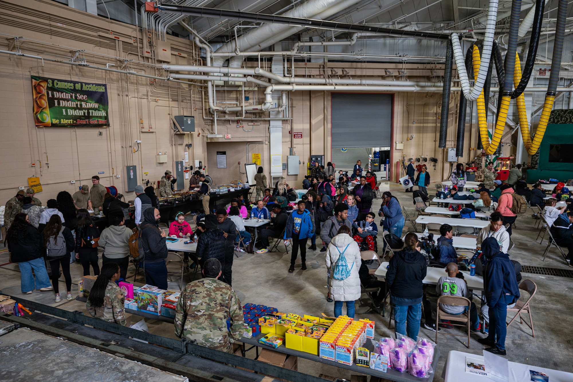 Students and faculty members of Mercer County Special Services School District take a break and eat a meal during the Special Needs Airshow, April 2, 2026 at Joint Base McGuire-Dix-Lakehurst, New Jersey.